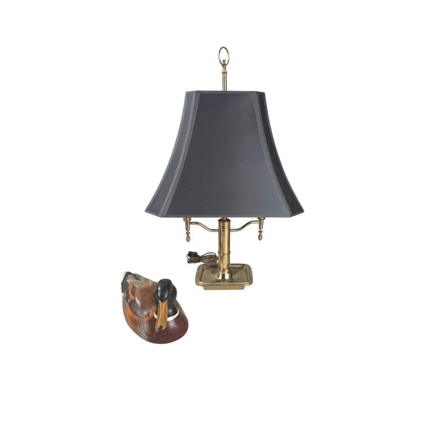 A signed Frederick Cooper of Chicago bouillotte lamp, its double-arm brass frame rising from a rectangular gadrooned tray...