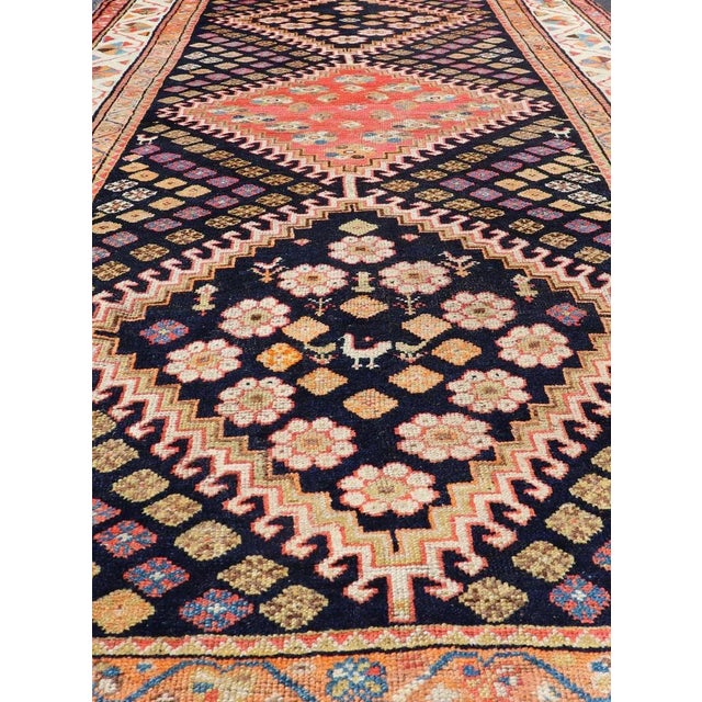 Early 20th Century Antique Persian Tribal Shiraz in Wool With Tribal Medallion Design For Sale - Image 5 of 12