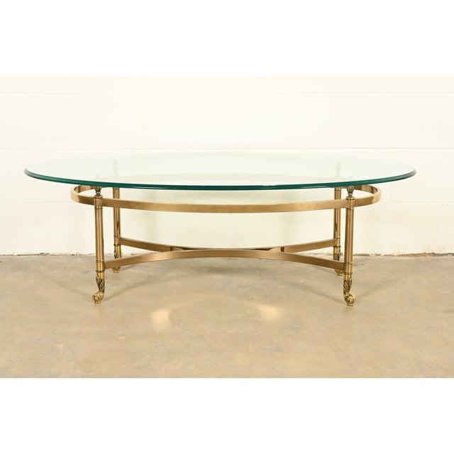 A gorgeous mid-century modern Hollywood Regency coffee table or cocktail table By LaBarge USA, Circa 1960s Solid brass...