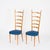 Woderful pair of high back Chiavari chairs made in a charming blonde beech wood with blue faux leather sear. These elegant...