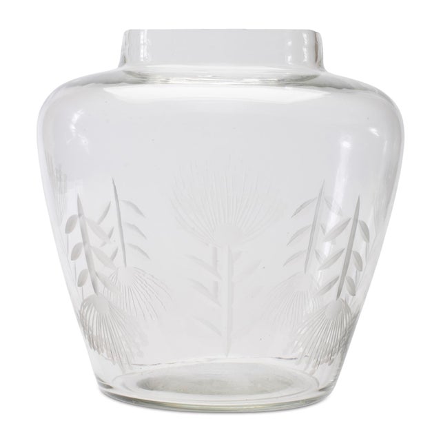 Add a touch of elegance to your space with this stunning Etched Soda Lime Glass Urn Vase. With a 6.5" diameter, this vase...