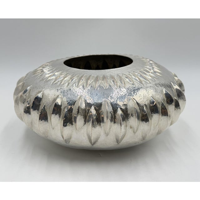 A striking vintage Mexican Modernist sculptural bowl by Los Castillo of Taxco, Mexico, handcrafted in solid copper and...