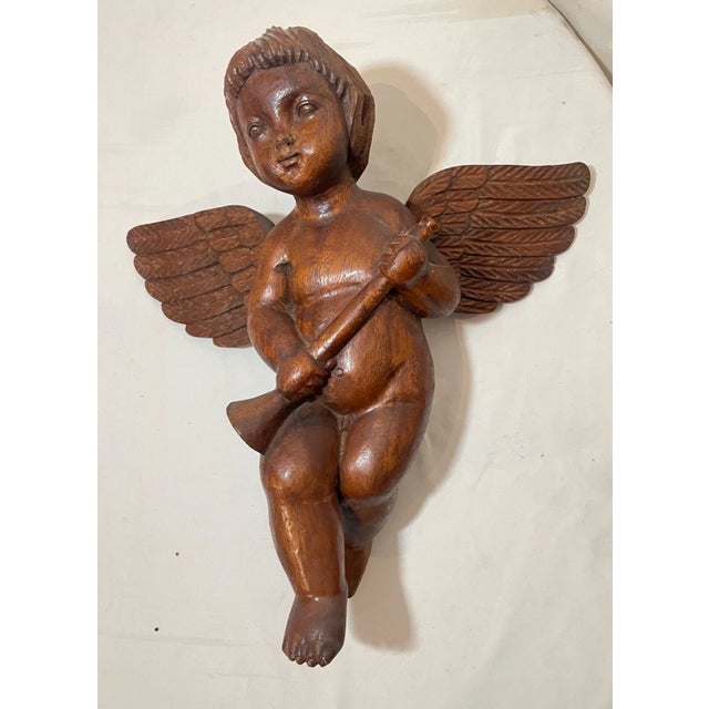 Up for sale is a rare antique hand carved 19th century Victorian wooden cherub sculpture. It's carved out of a piece of...