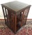 Edwardian mahogany inlaid revolving bookcase, the square top framed with a marquetry string inlaid burl border, sixteen...