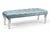 A refined contemporary bench featuring a clean, architectural silhouette softened by deep button tufting. The elongated...
