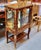 Elegant and refined, this petite French Louis XV-style display cabinet is crafted from richly finished wood and adorned...