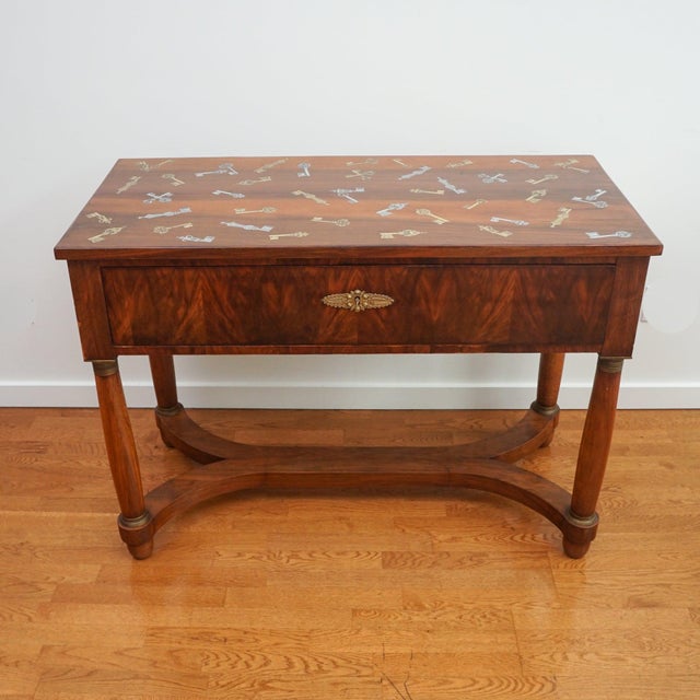 The exquisite early 1800s antique table desk, shown here, represents the first collaboration between MC HOME and...
