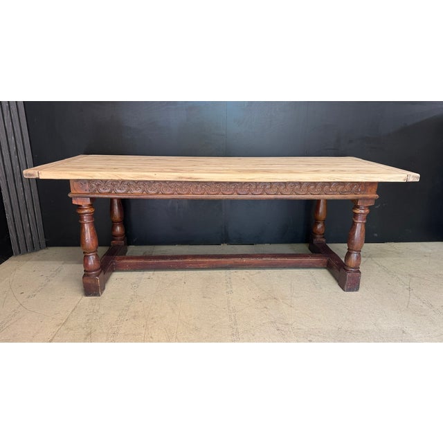 A nice Farmhouse Dining Table having 4 plank top and unusual base with carved freeze. English in origin and dating to the...