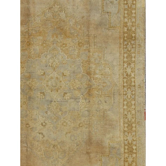 Mid-Century vintage Turkish Oushak rug with central medallion design in tan, rug is-155, country of origin / type: Turkey...