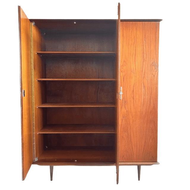 Cool vintage mid-century duotone Danish design wardrobe from the 1960s. This duo colour wardrobe has 3 doors, finished in...