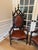 Offered is a striking and exceptionally substantial matched pair of 19th-century Victorian Gothic Revival armchairs,...