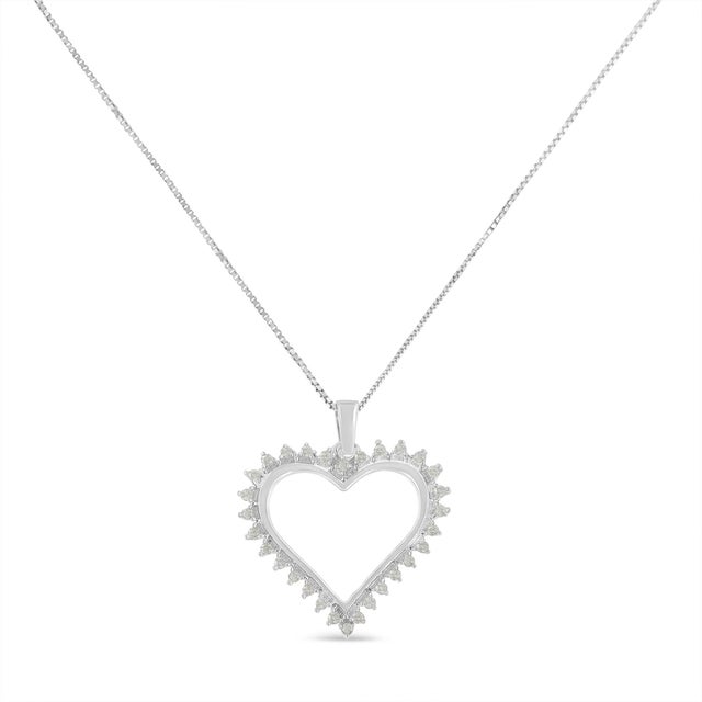 A shimmering halo of prong set, round cut diamonds sit around a lovely open heart pendant. 1/4ct TDW of diamonds sparkle...