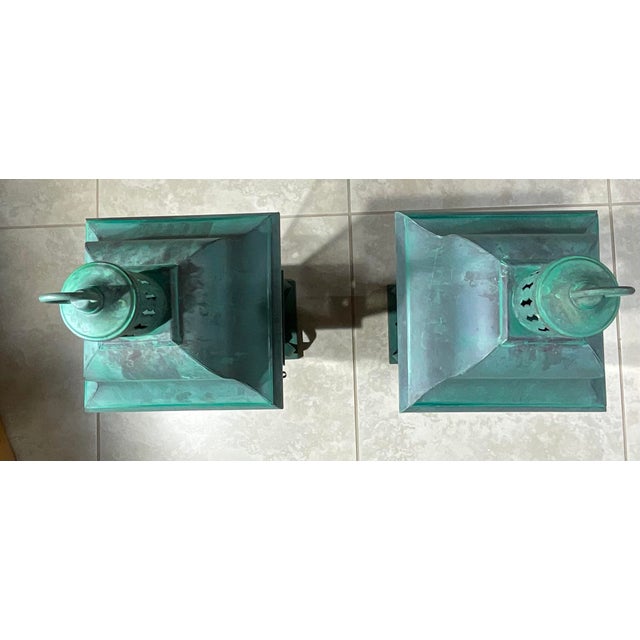 add a timeless historical touch to your entryway with this spectacular matching pair of solid brass outdoor post lanterns....