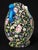 "Gueulard" vase in glazed ceramic from Gien / Handles in the shape of Foo dogs. Black background with floral decoration....