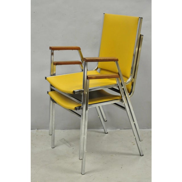 Vintage Nightingale Mid Century Modern Chrome & Yellow Vinyl Stacking Office Chair Pair. Circa Mid 20th Century....