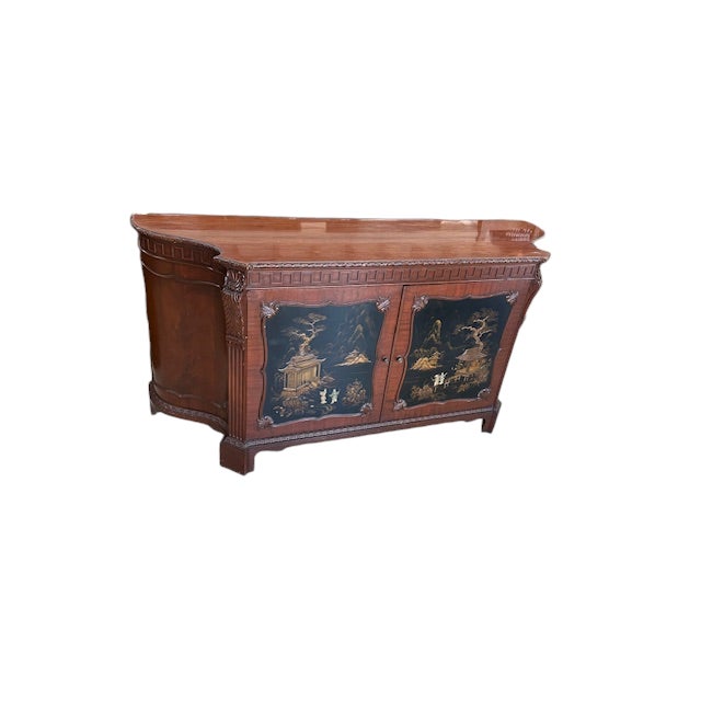 This is a unique mahogany credenza with chinoiserie panels. It was made in England, circa 1920's.