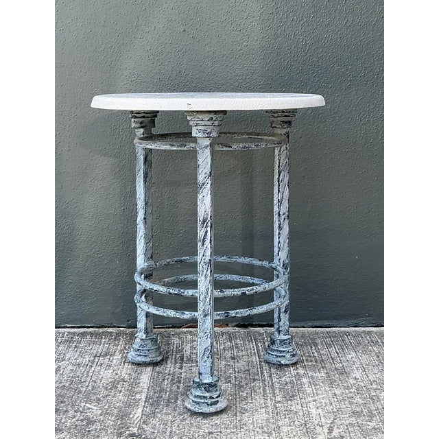 Add a touch of architectural elegance to your patio or sunroom with this striking Postmodern side table. This piece...