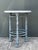 Add a touch of architectural elegance to your patio or sunroom with this striking Postmodern side table. This piece...