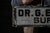 Antique medical office scalloped glass sign from Austin, MN. This piece features a carved glass exterior set into a...