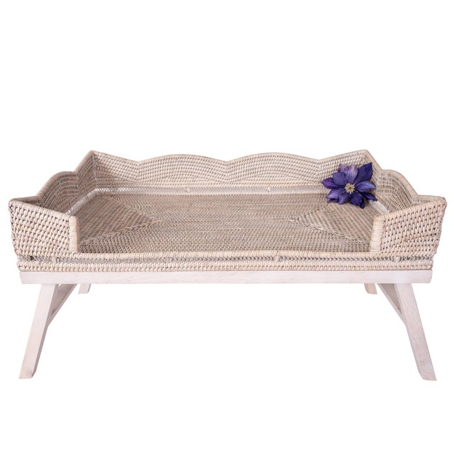 Crafted from sustainable Burmese rattan, the Scallop Design Breakfast Tray with Wooden Legs blends practical functionality...