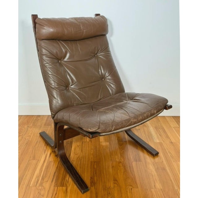 Original Ingmar Relling armchair with a bent birch wood base, removable leather cushion, neck pillow, brown canvas...