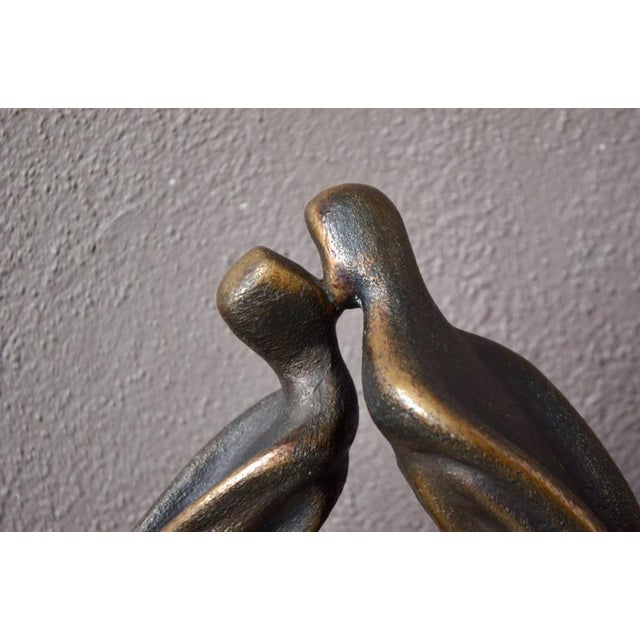 Let us leave, in a kiss, for an unknown world. Alfred de Musset Beautiful bronze, representing two stylized characters...