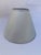 A single small empire shape lamp shade covered in a silver sage solid fabric. 10" base 6.5" height 10.5" slant 5.5" uno...