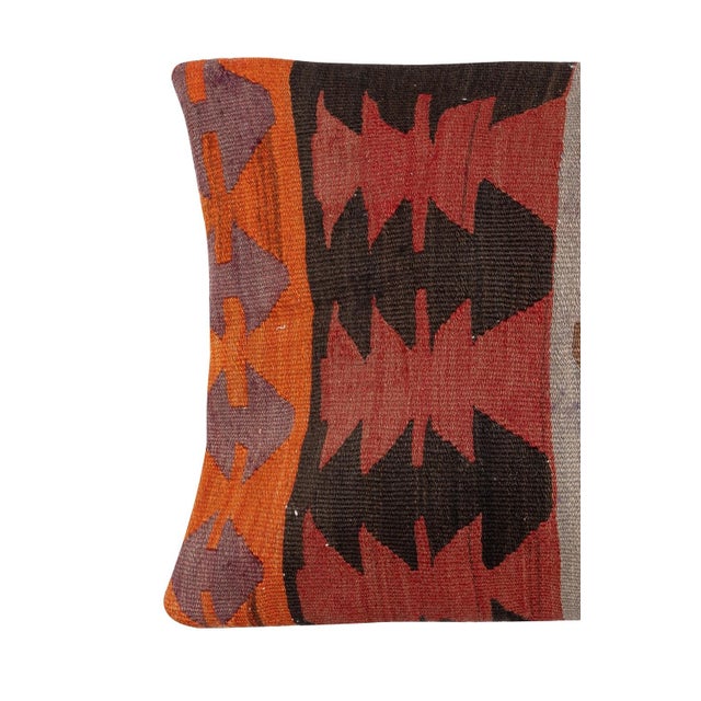 Add a touch of history and warmth to your space with this vintage handmade Turkish wool kilim cushion cover. Crafted from...
