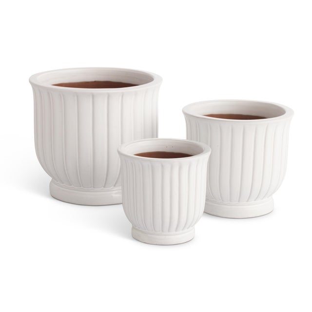 This set of earthenware pots are designed for the outdoors, but are equally as beautiful indoors. From the depth of the...