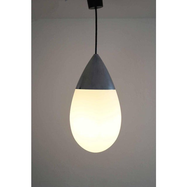 Giant Limburg Drop hanging lamp. Milky glass dome with chrome -plated gear. E27 version 20cm total height including the...