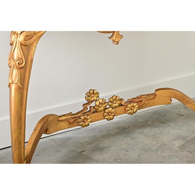 French Art Nouveau giltwood console table circa 1900, a sculptural piece of furniture that expresses the artistry of the...