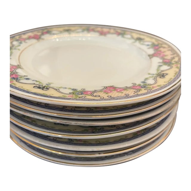 Offered is a vintage set of dessert/salad China plates. This set features a timeless floral design with an array of...