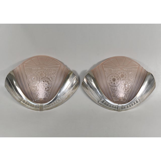 G. VIARMÉ A beautiful pair of 1925-1930 French art deco wall sconces in nickel plated solid brass or bronze holding two...