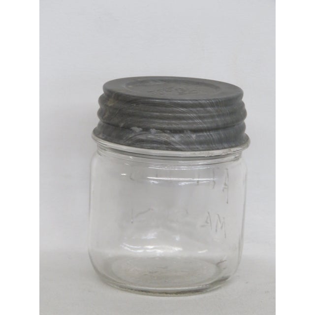 This beautiful Small Lidded Jar is made of glass and metal. This small jar has an adorable vintage style, it has a lovely...