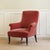 This high-backed upholstered armchair dates from around 1880 and follows the then-common form of fully upholstered seating...