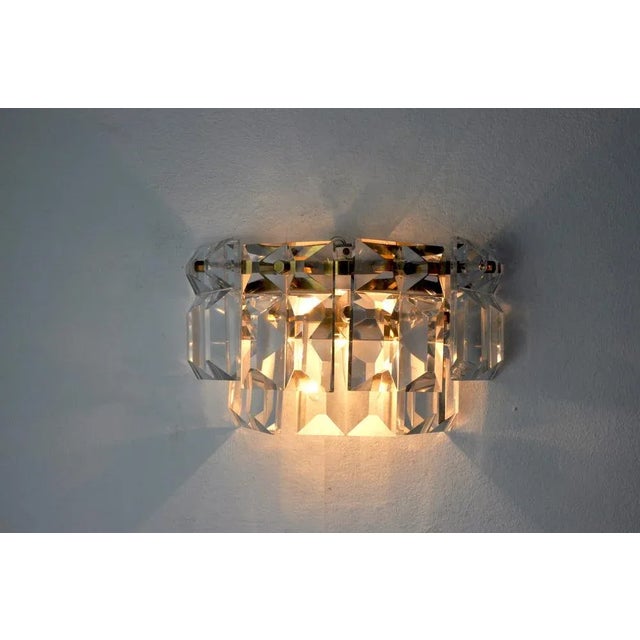 Superb kinkeldey applique designated and produced in germany in the 1970s. Crystals cut and distributed on a golden metal...