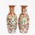 A fine pair of antique Chinese export porcelain vases. In the Rose Canton or Famille Rose style. Decorated throughout with...