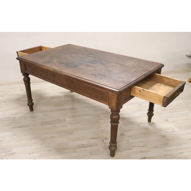 This exquisite Italian rustic table, crafted in the early 20th century from solid oak, combines functionality with...