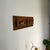 A carved wood panel from 1920s China, reimagined as a sculptural wall piece — equally at home above a fireplace, in an...