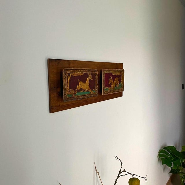A sculptural wall art composition composed of an early 20th-century Chinese giltwood carved panel, mounted on a solid wood...