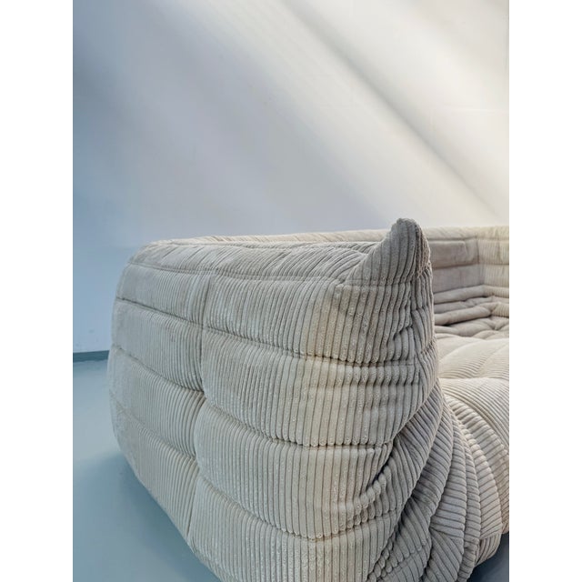 This Togo has been reupholstered with new foam and leather, preserving its shape & iconic looks.The bottom could show some...