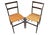 Pair of model 699 “superleggera” chairs, designed by gio ponti (1891-1979) for cassina (unsigned) in 1957. the model is...
