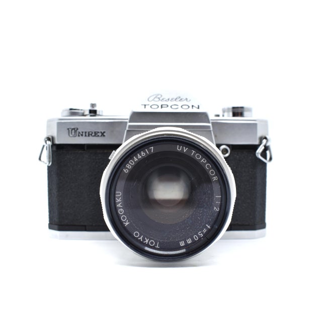 This classic Beseler Topcon Unirex is a standout piece of mid-century Japanese engineering, perfect for the vintage tech...