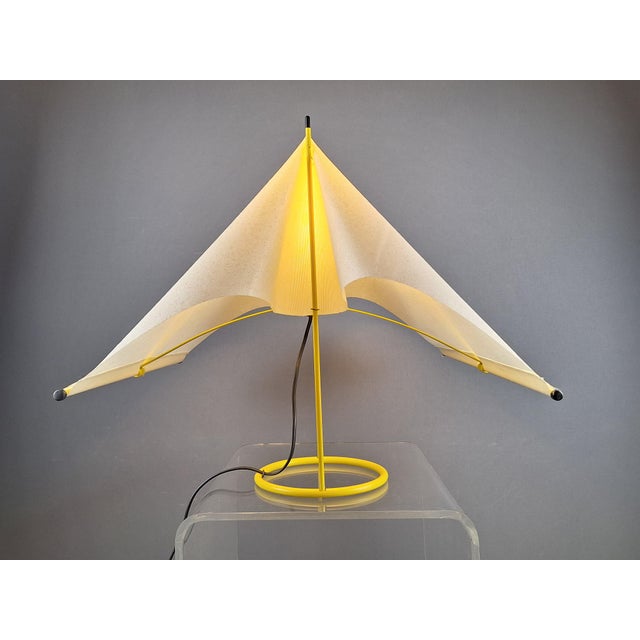 Le Falene table lamp by Arteluce, designed by Oiero de Martini, 1980, yellow lacquered metal frame and cream-colored...