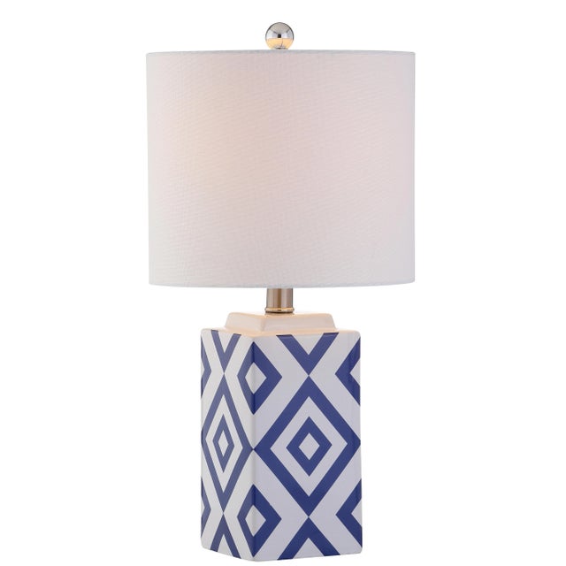 The perfect blend of style and substance, this contemporary table lamp gives a modern update to any living room. Designed...