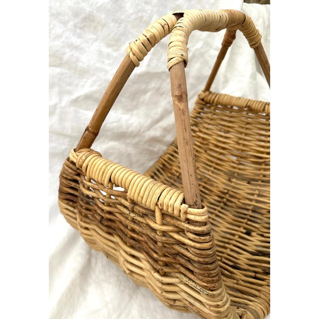 Vintage Woven Rattan Firewood Basket or Gathering basket in neutral. Perfect for flowers, magazines, yarn, or firewood....