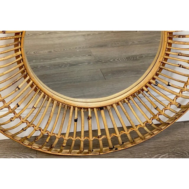 Albini style sunburst bamboo & rattan mirror A fine example, well executed of a continuous surround of 3-inch high curved...