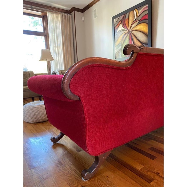 This is a beautiful vintage Duncan Phyfe-style sofa. Very comfortable and stylish in good condition. Has been in the...