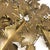 Circa 1960. We offer this Brutalist brass wall sculpture in leaves form, signed by EBANO.
