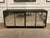Stylish Currey & Co Mosaico Credenza. Black wood with mirrored mosaic style front. Original retail $5490. Showroom floor...